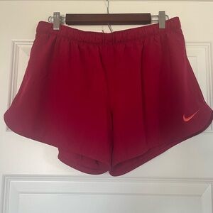 NIKE dri-fit size large running shorts with inner bike short lining